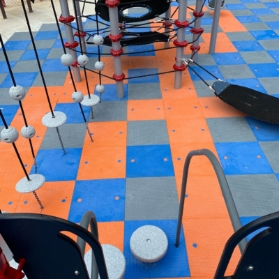 climbing playground equipment installed on safety surfacing