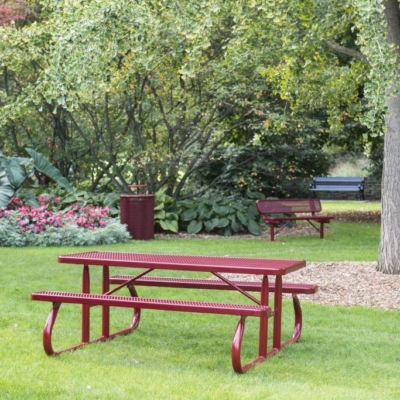 red picnic bench in a small park